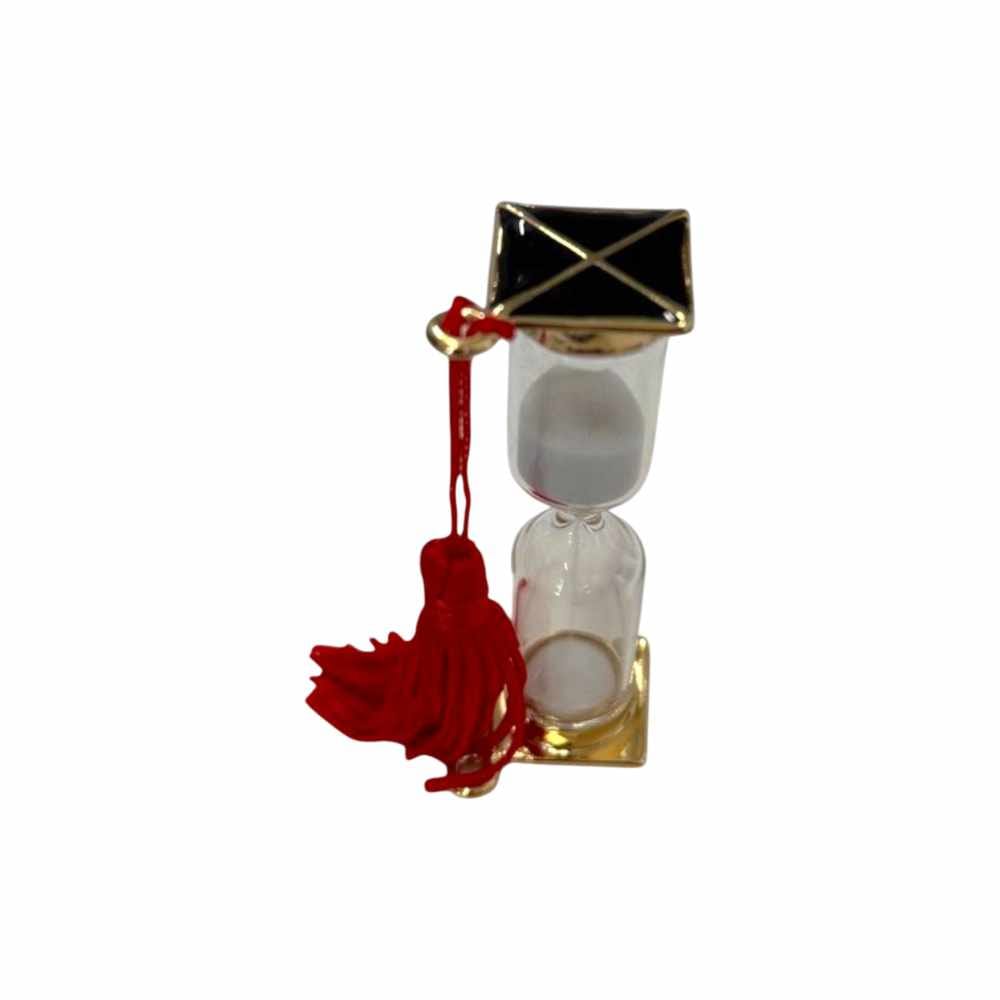 Bomboniera laurea clessidra oro con tocco nero e nappa rossa